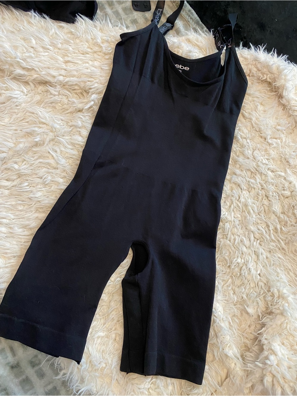 bebe Black Shaping Jumpsuit Compress Romper with Branded Straps
